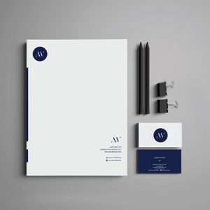 Around Wellness branded stationery set including letterhead, business card, and corporate collateral in navy and white.