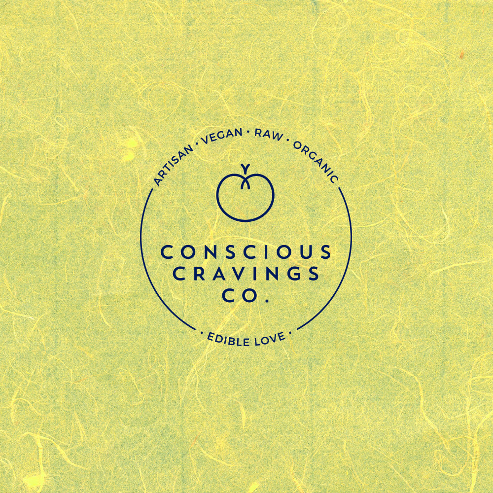 Conscious Cravings Co full logo in brand green on a textured yellow background