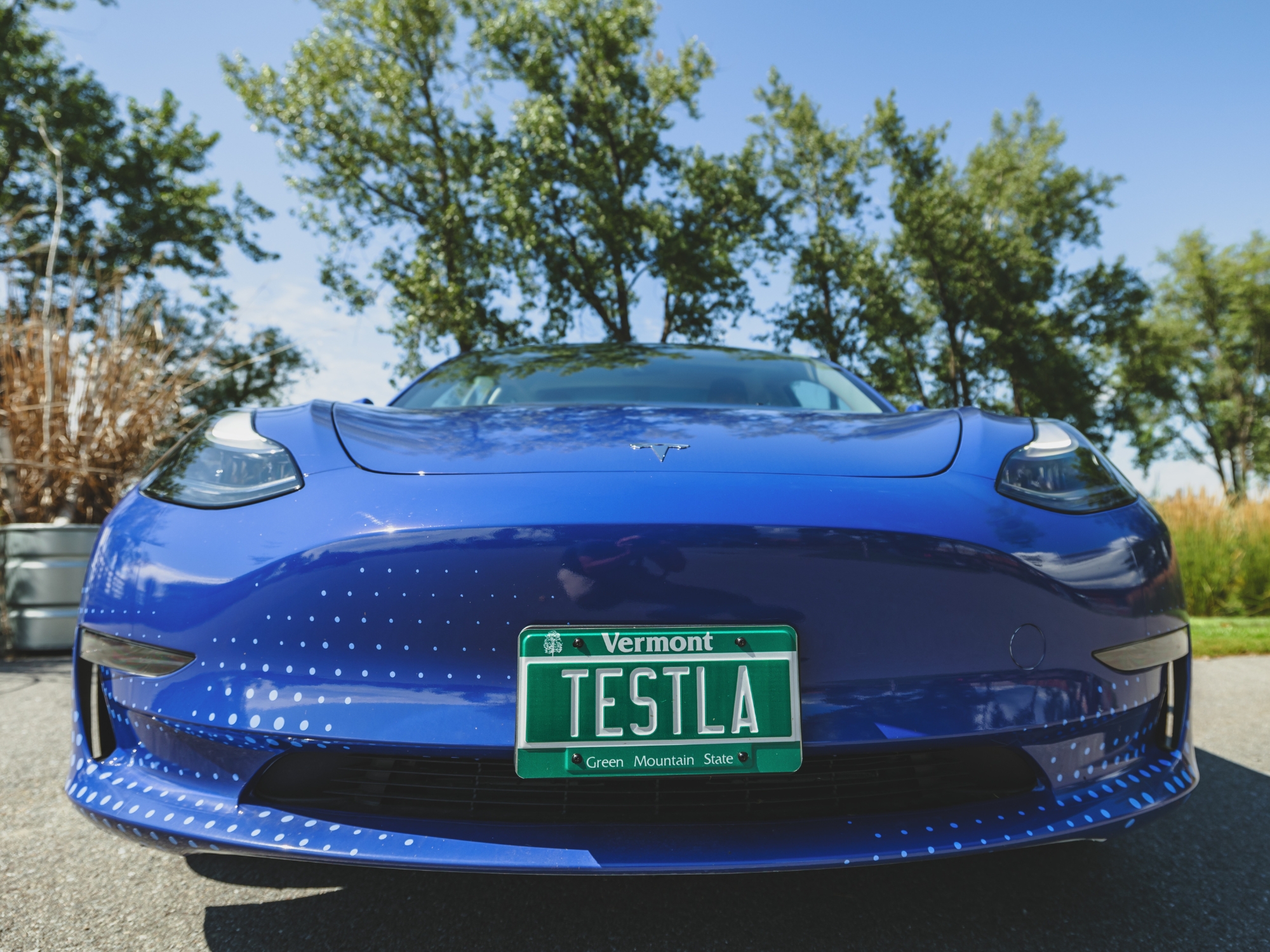 Front view of EnergyHub branded Tesla car wrap designed by Sonja Meyer.