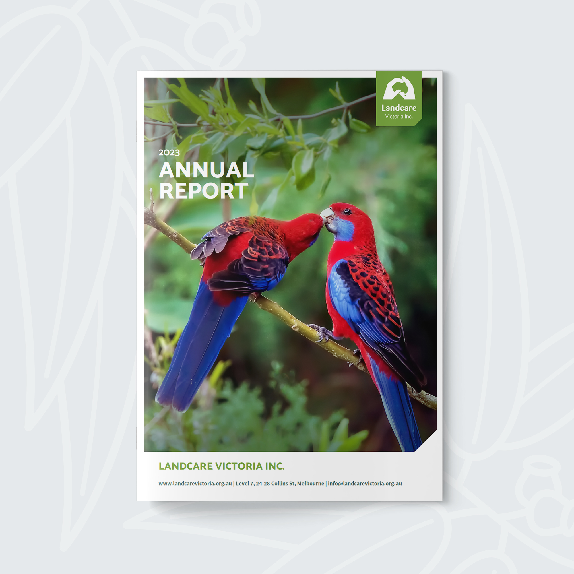 Cover of Landcare Victoria 2023 Annual Report featuring two crimson rosellas perched on a branch, designed in full colour on patterned light grey background.