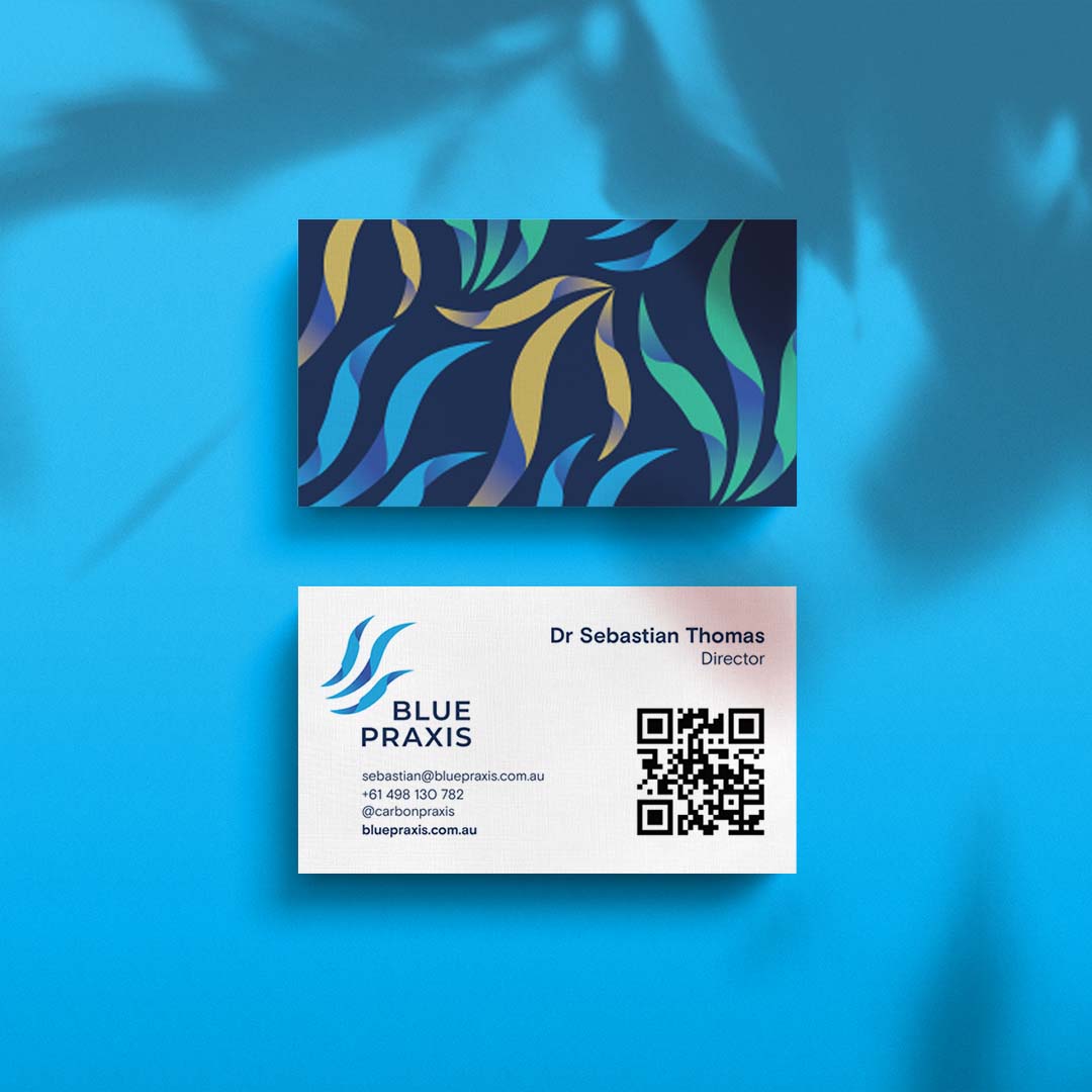 Blue Praxis business card mockup in full colour showing front and back designs on a blue background.