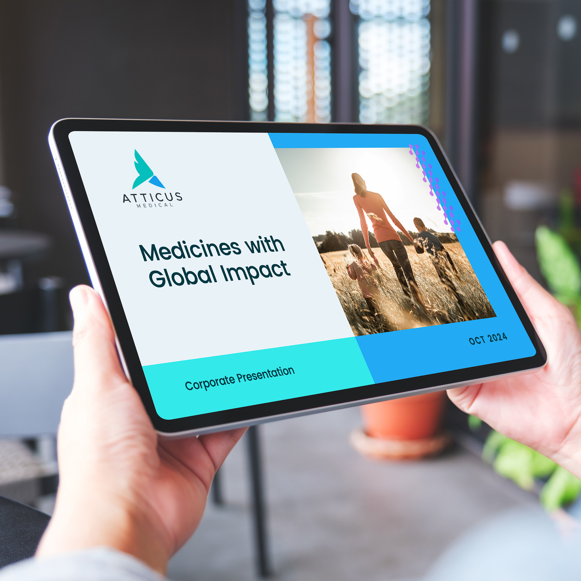 Tablet displaying the cover slide of Atticus Medical’s corporate presentation titled 'Medicines with Global Impact,' featuring a logo and an image of a person walking with children in a field.