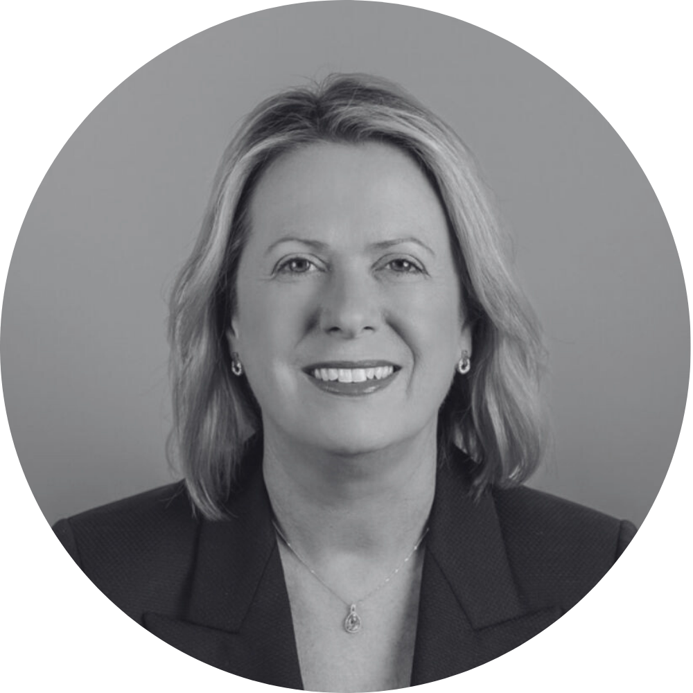 Michelle Rayner headshot - Co-Founder & COO of Oktopi - grey circle cropped