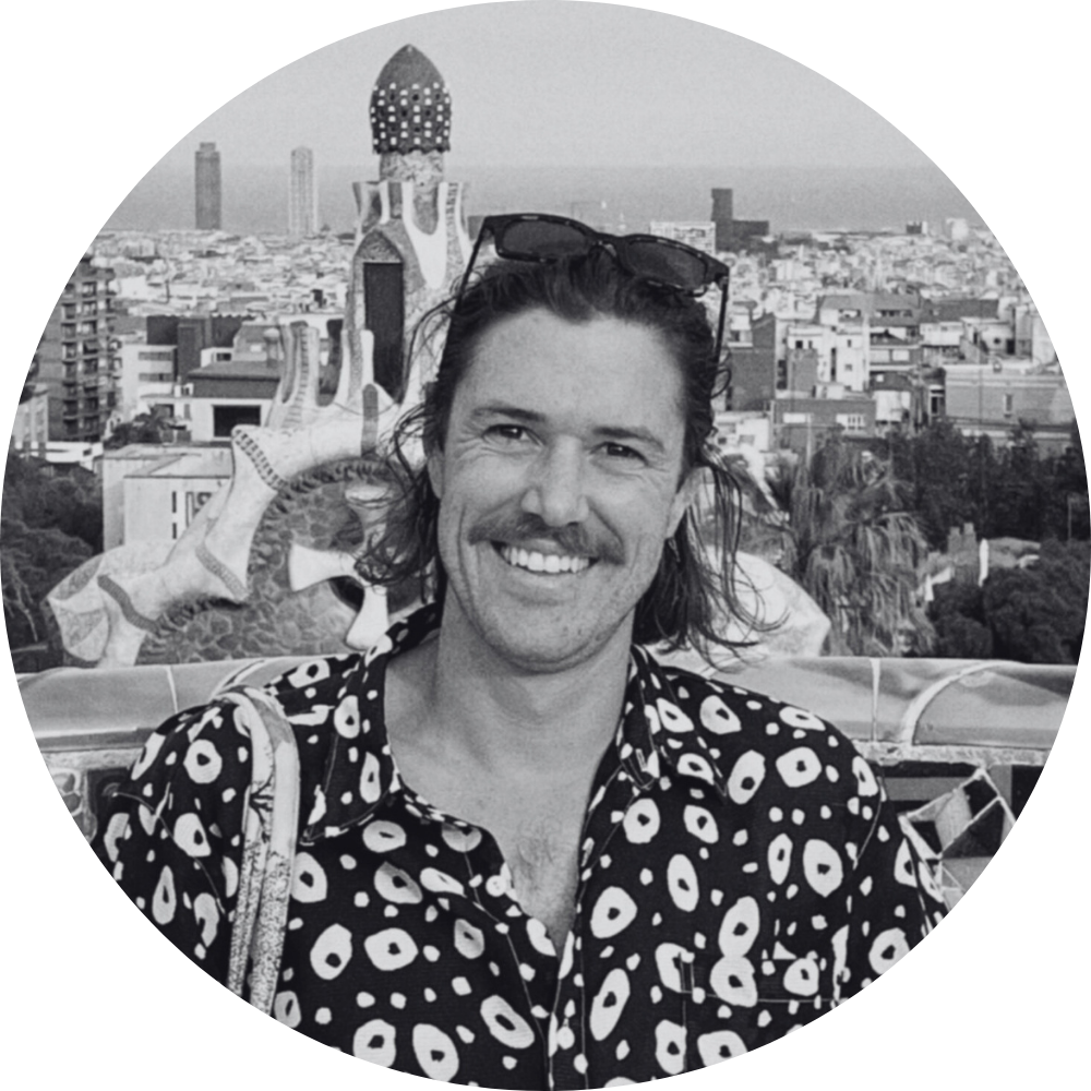 Riley Pierce headshot - greyscale and circle cropped