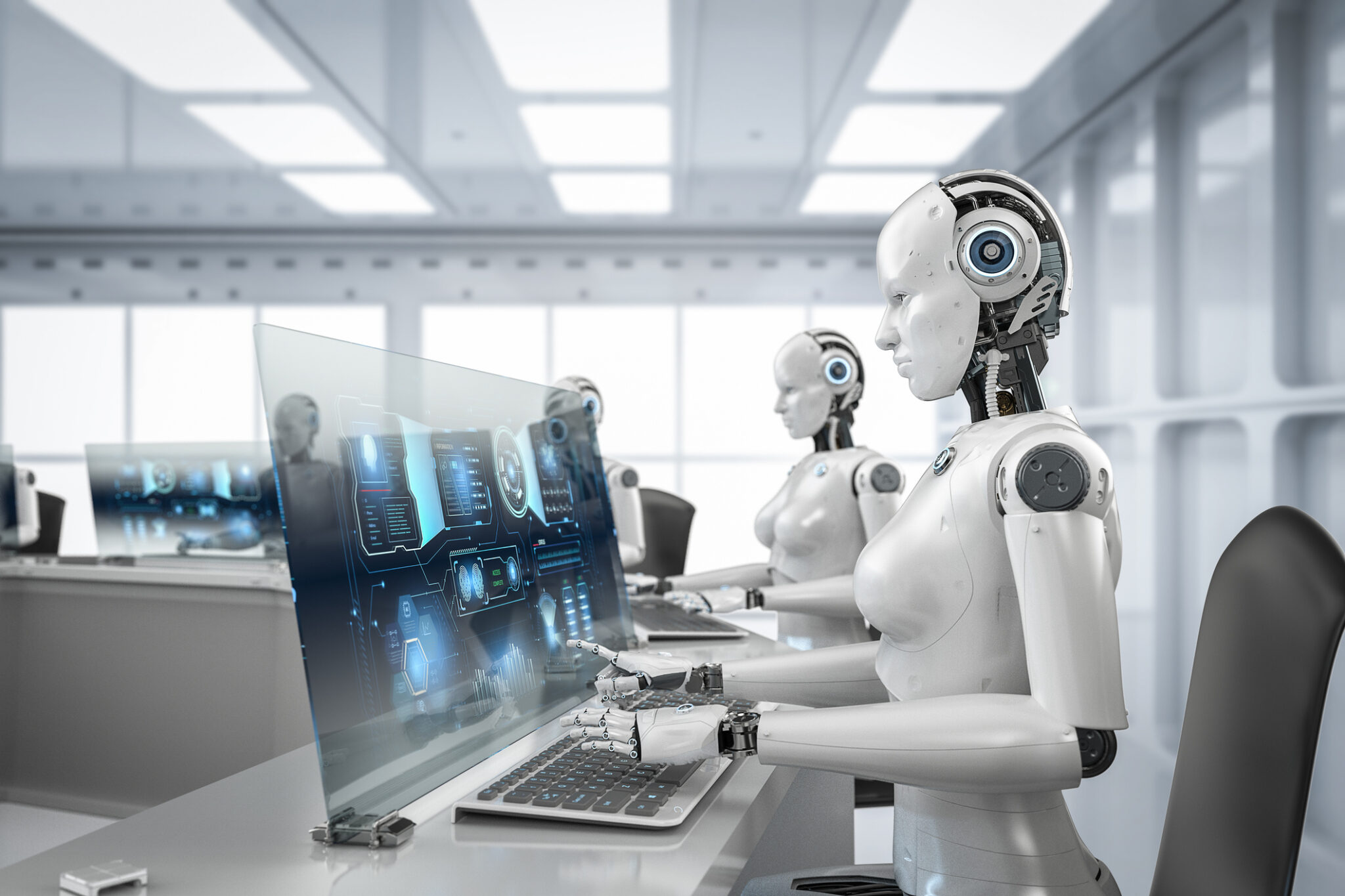 AI robots working at computers in a futuristic office, symbolising how automation is changing everyday work.
