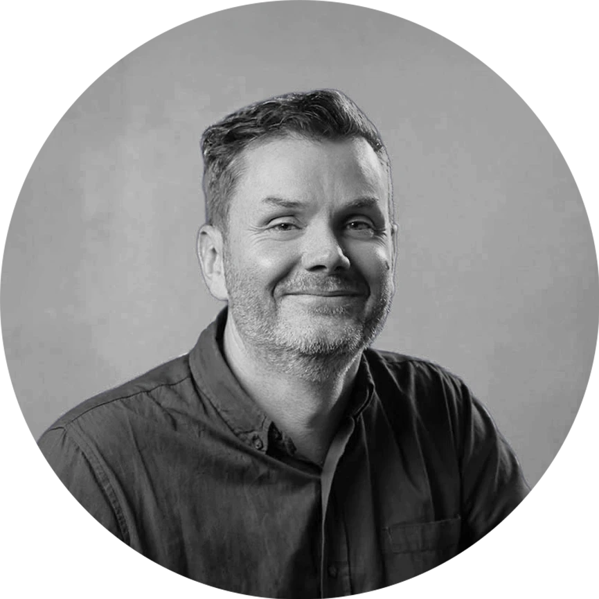 Black-and-white headshot of Luke Sharrock, Webflow Developer at Ethical Design Co.